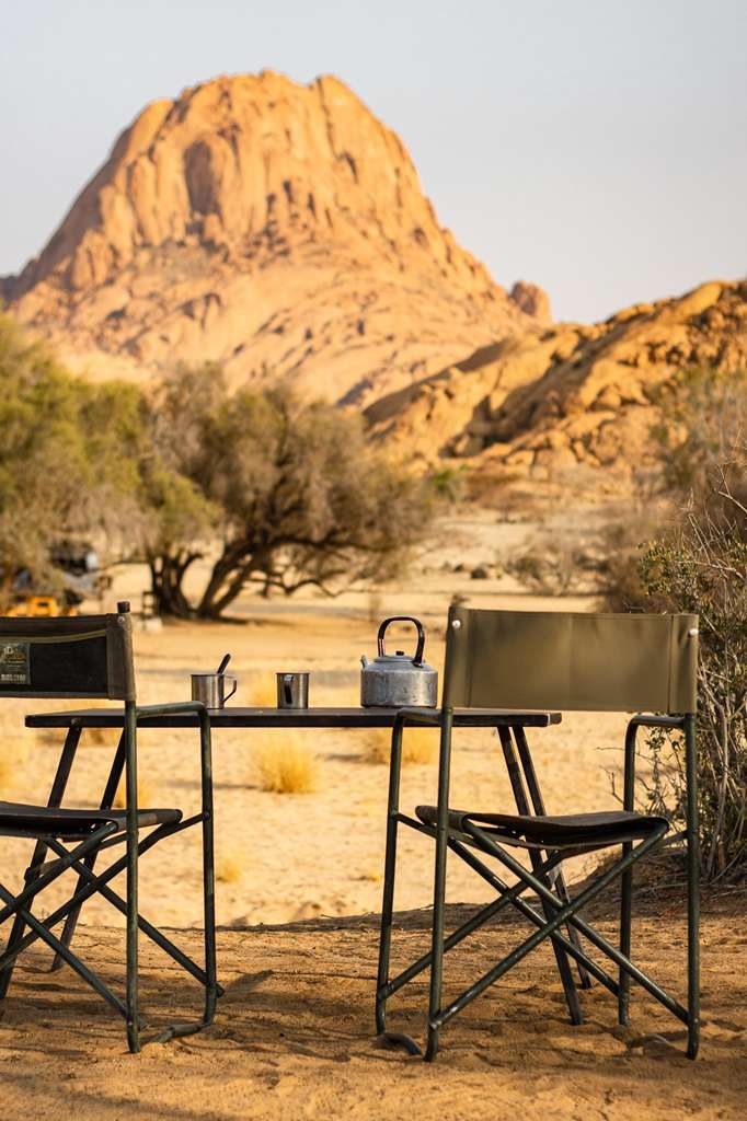 Camping setup in Namibia Namibia itinerary_morning coffee with a view at Spitzkoppe