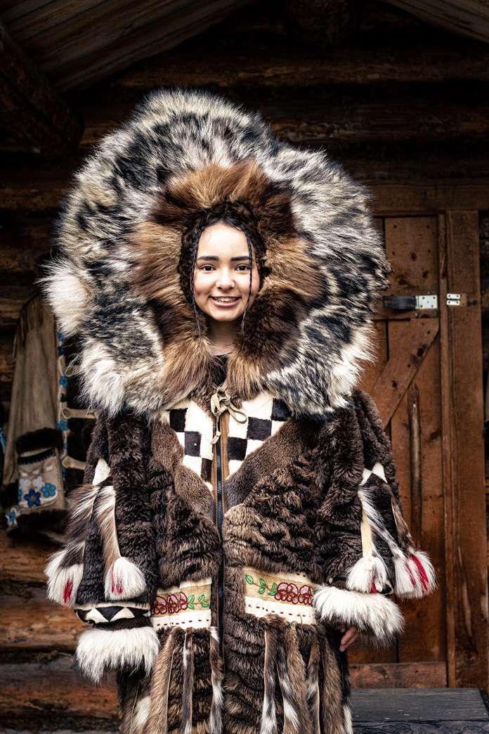 Woman in traditional Athabascan outfit