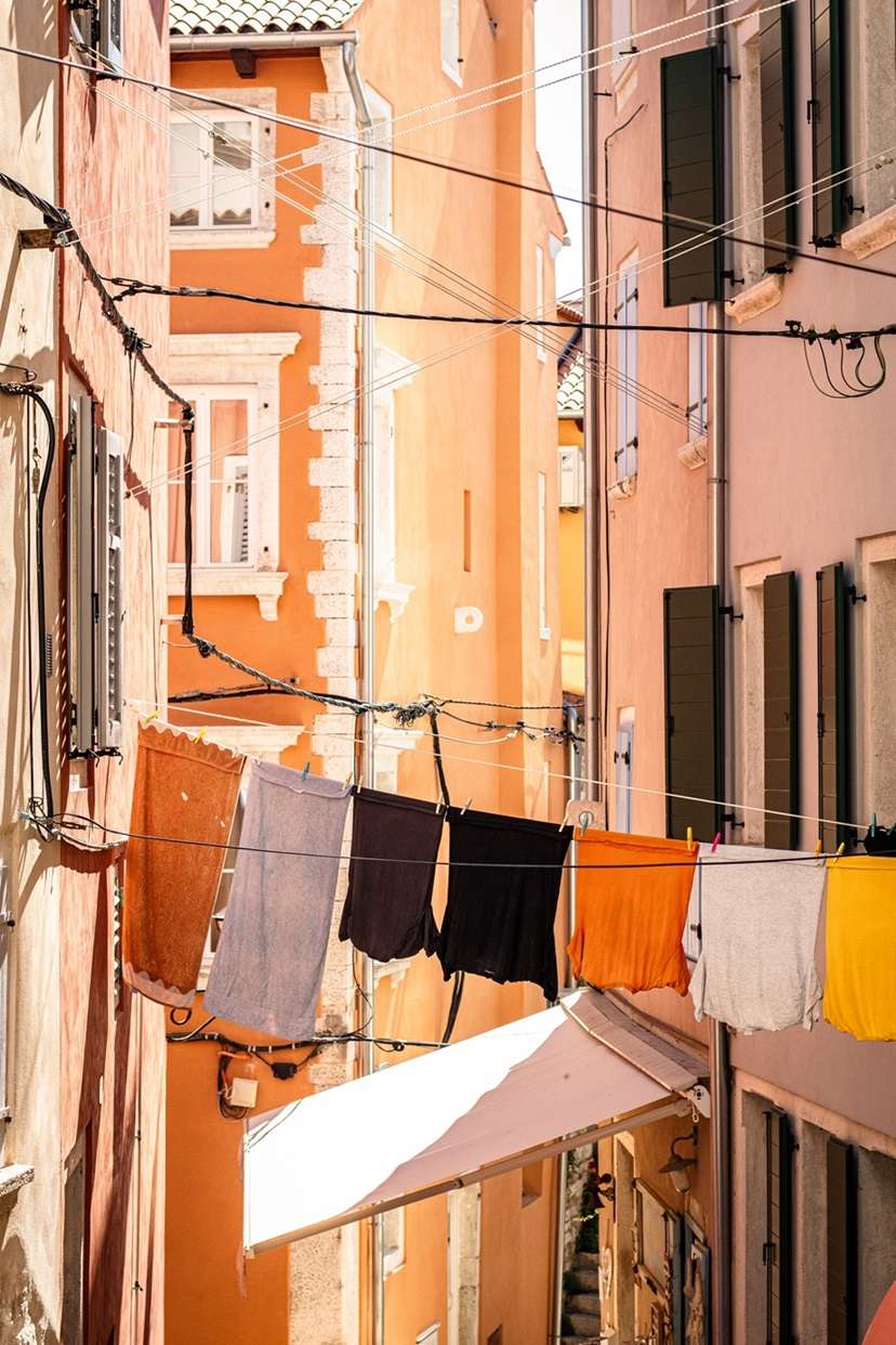 Clothes hanging across a street in Rovinj