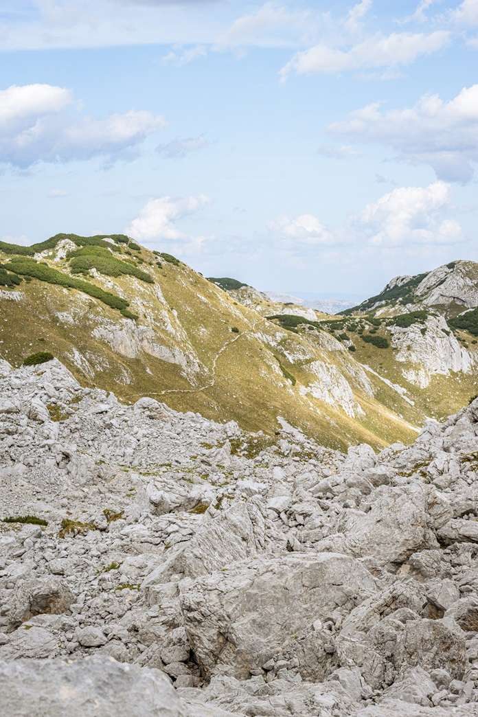 Trail leading across rubble