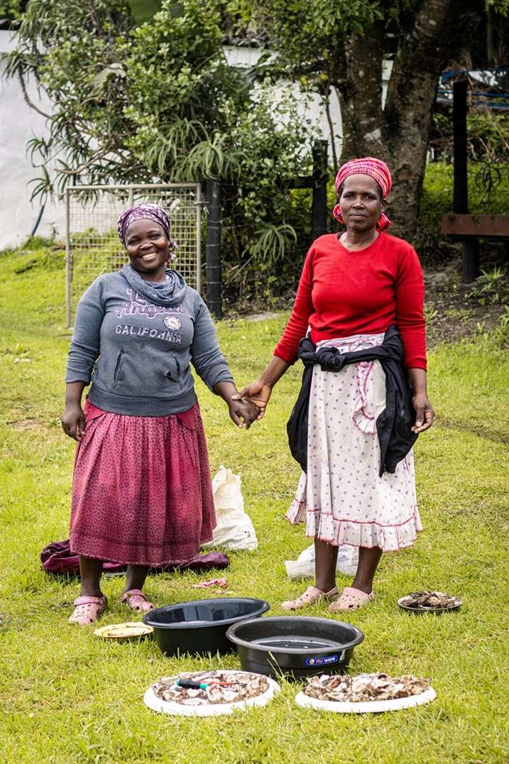 Women selling oysters 2-week Namibia itinerary